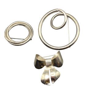 Set of three retro silver tone pins two for scarves one large bow pin